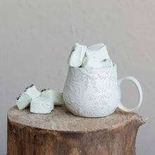 Load image into Gallery viewer, Embossed Snowflakes Stoneware Mug, Reactive Glaze
